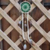 Suspente centrale ornée de perles en bois céramique plumes et rubans assortis